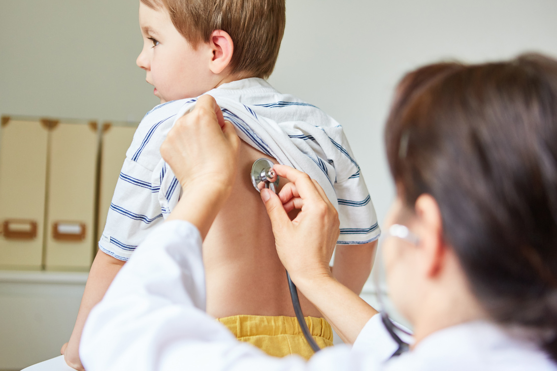 Pediatrician Listening to a Child's Lungs